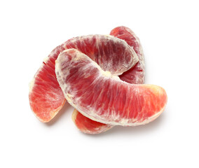 Tasty blood orange segments on white background