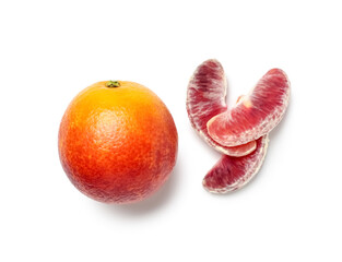 Whole blood orange fruit with pieces on white background