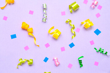 Colorful on confetti on lilac background