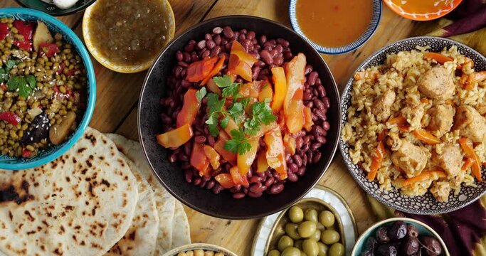 A dish of beans with vegetables. Healthy vegan food, sauces snacks salads cereals.
