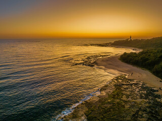 Sunrise over the sea and bay with clear skies