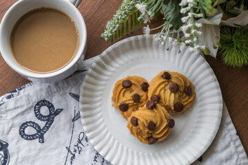 Fresh Homemade Chocolate Chip Cookie on the Table, Traditional Crispy Crunchy Snack with Coffee