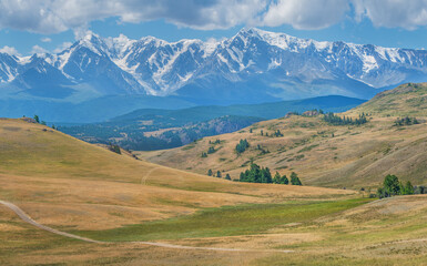 Fototapeta premium Mountain scenery, snow-capped mountain peaks, sunny day