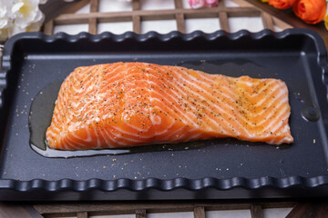 Fresh salmon coated with olive oil