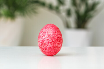 Easter egg colored with dye and rice grains. Unusual ways to decorate Easter eggs.