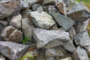 Limestone piles, stones used for construction or as a component of mortar. Break stones. Close Up.
