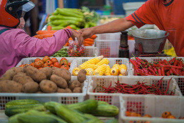 Close up shot of groceries transactions in traditional markets