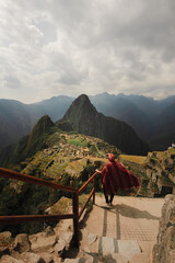 person overlooking landscape in machupicchu peru - obrazy, fototapety, plakaty