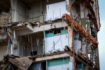 dismantled old building. Half demolished house, dismantling of the old one for the construction of a new building