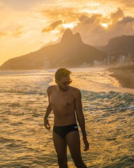 man at ipanema at sunset