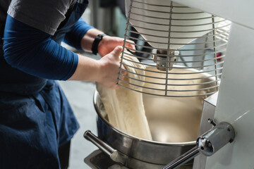 Dough Kneading Machine in a Restaurant Kitchen
