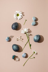 Blue eggs and white flowers on an Easter card