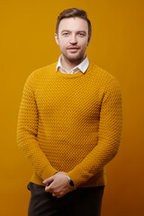 man in yellow sweater