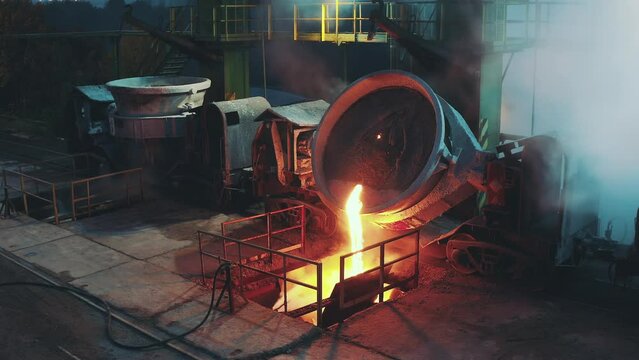 Slag tapping from railway wagon from drone