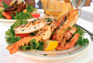 Grilled langostino and fish filet at a restaurant, Vernazza, Cinque Terre, Italy