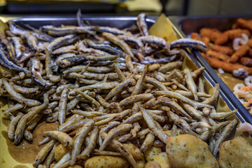 Italian street food, deep fried anchovies in Riomaggiore Cinque Terre, Italy