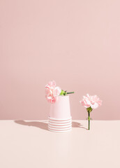 Stack of pink paper coffee cup