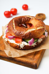 Concept of delicious food - tasty bagel sandwich