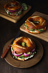 Concept of delicious food - tasty bagel sandwich