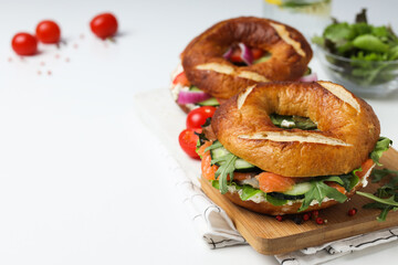 Concept of delicious food - tasty bagel sandwich, space for text