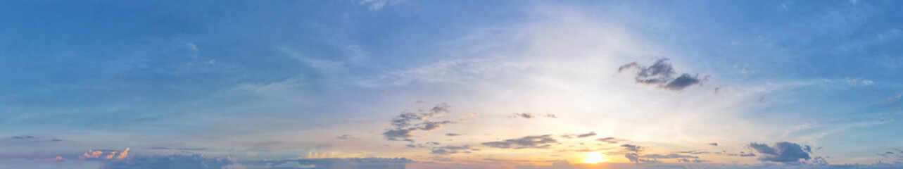 The blue sky and dark blue clouds provided a dramatic backdrop to the beautiful sunset panorama, Sky background.