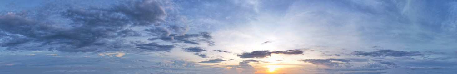 Panorama of beautiful sunset light with blue sky and dark blue clouds, Sky background.