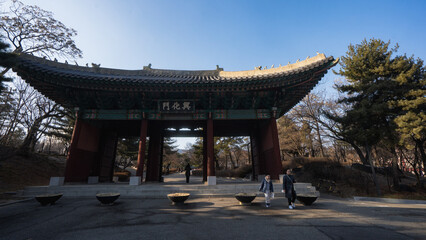 Naklejka premium Gyeonghuigung or Gyeonghui Palace Entrance during winter evening at Jongno-gu , Seoul South Korea : 8 February 2023