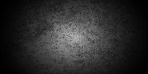 Dark black background with texture Close up retro plain black color cement wall panoramic background. texture for show or advertise. Empty concrete wall with black cement wall texture background.
