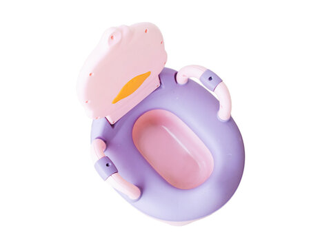Pink Plastic Potty For Children. Photo On White Background. Potty for baby on white background. Baby learns to using toilet. Image of toilet training.