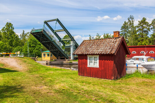 Göta Canal with boats at a open bascule bridge in Sweden