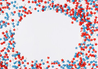 colorful star shape sprinkes decorations for fourth july , copy space
