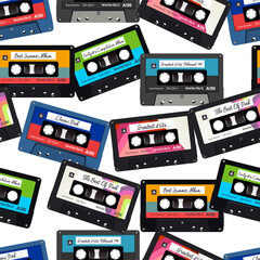 Old colorful  audio cassettes seamless background