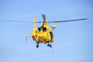 Fototapeta na wymiar Helicopter of the coast guard in Rotterdam harbor.