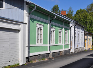 Fototapeta na wymiar Old wooden houses in summer