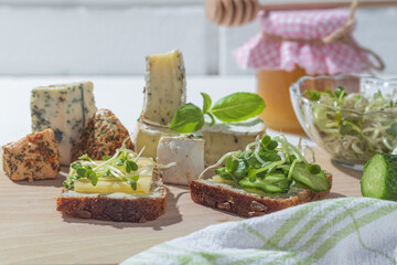 Freshly made vegetarian sandwich with alfalfa sprouts and cheese