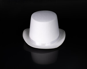 white magician hat isolated on black background