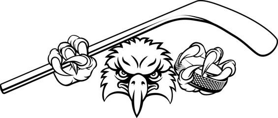 An eagle ice hockey player animal sports mascot holding a hockey stick and puck