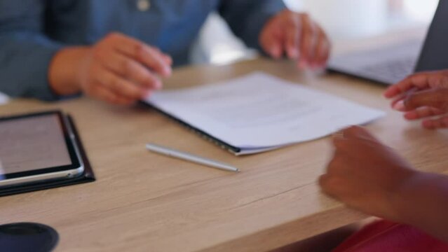 Business people, interview and hands signing document for hiring, recruitment or contract on office desk. Hand of employer writing, filling form or signature in recruiting process for application