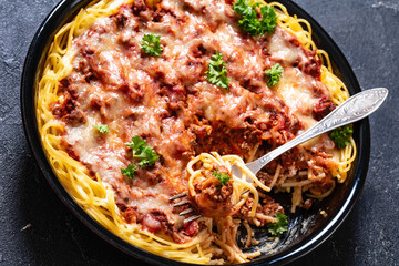baked spaghetti with ground beef, sauce, cheese