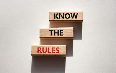 Know the rules symbol. Wooden blocks with words Know the rules. Beautiful white background....