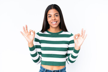 Obraz premium Young African American woman isolated on white background showing an ok sign with fingers