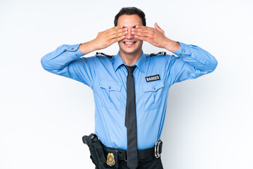 Young police caucasian man isolated on white background covering eyes by hands