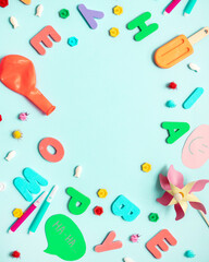 
layout for april fool's day with various decorations, letters, confetti, stickers on a blue...