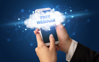 Hand using smartphone with cloud business concept