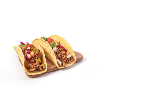 Mexican tacos with meat and vegetables isolated on white background with copy space. Created with Generative AI Technology