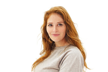 Portrait of perfect mid adult woman with curly ginger hair looking at camera