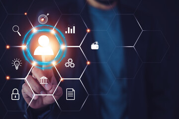 Businesspeople touching on screen to target customer. Target customer, buyer persona, customer behavior concept. Marketing plan and strategies. Personalization marketing, customer centric strategies.