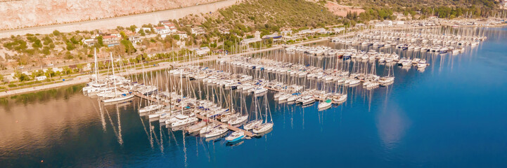 Docked luxury yachts Boat in a port. Yacht club aerial view, wide banner