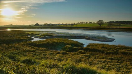 Beautiful view of the rural English nature reserve at sunset in Suffolk, England
