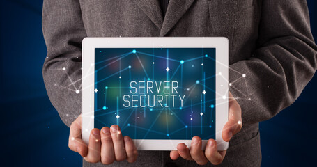 Person holding tablet, security concept